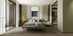 Grey bed in luxury bedroom by Square One Construction.
